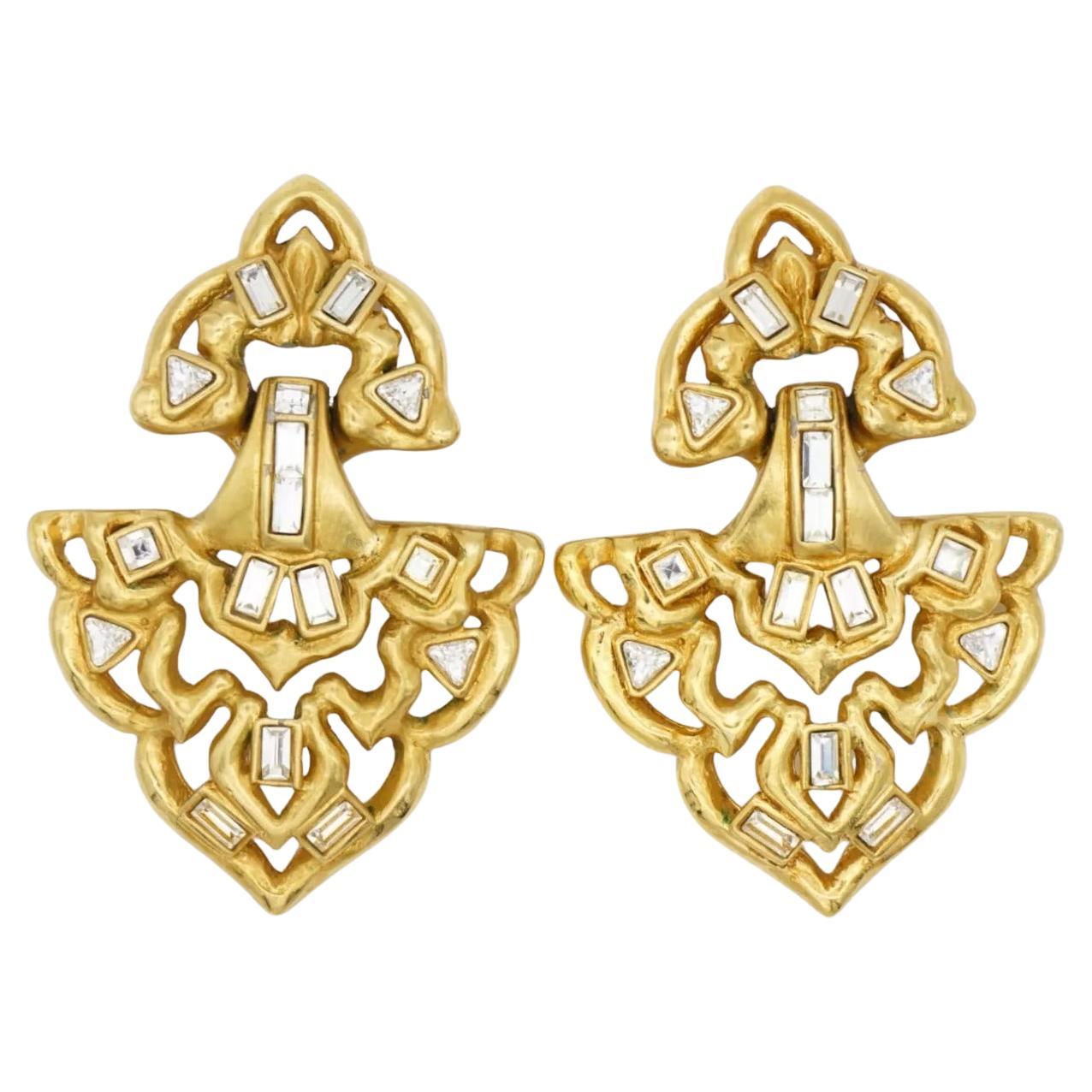 Yves Saint Laurent YSL Vintage Massive Door Knocker Crystals Openwork Chunky Exquisite Drop Clip Earrings, Gold Tone

Vintage and very rare to find. 100% Genuine. Signed at the rear.

Very good condition. Come with original box and