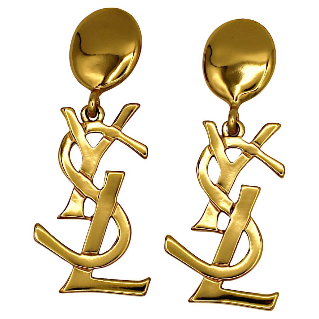 YVES SAINT LAURENT YSL Vintage Massive Gold Tone Iconic Logo Dangling Earrings For Sale