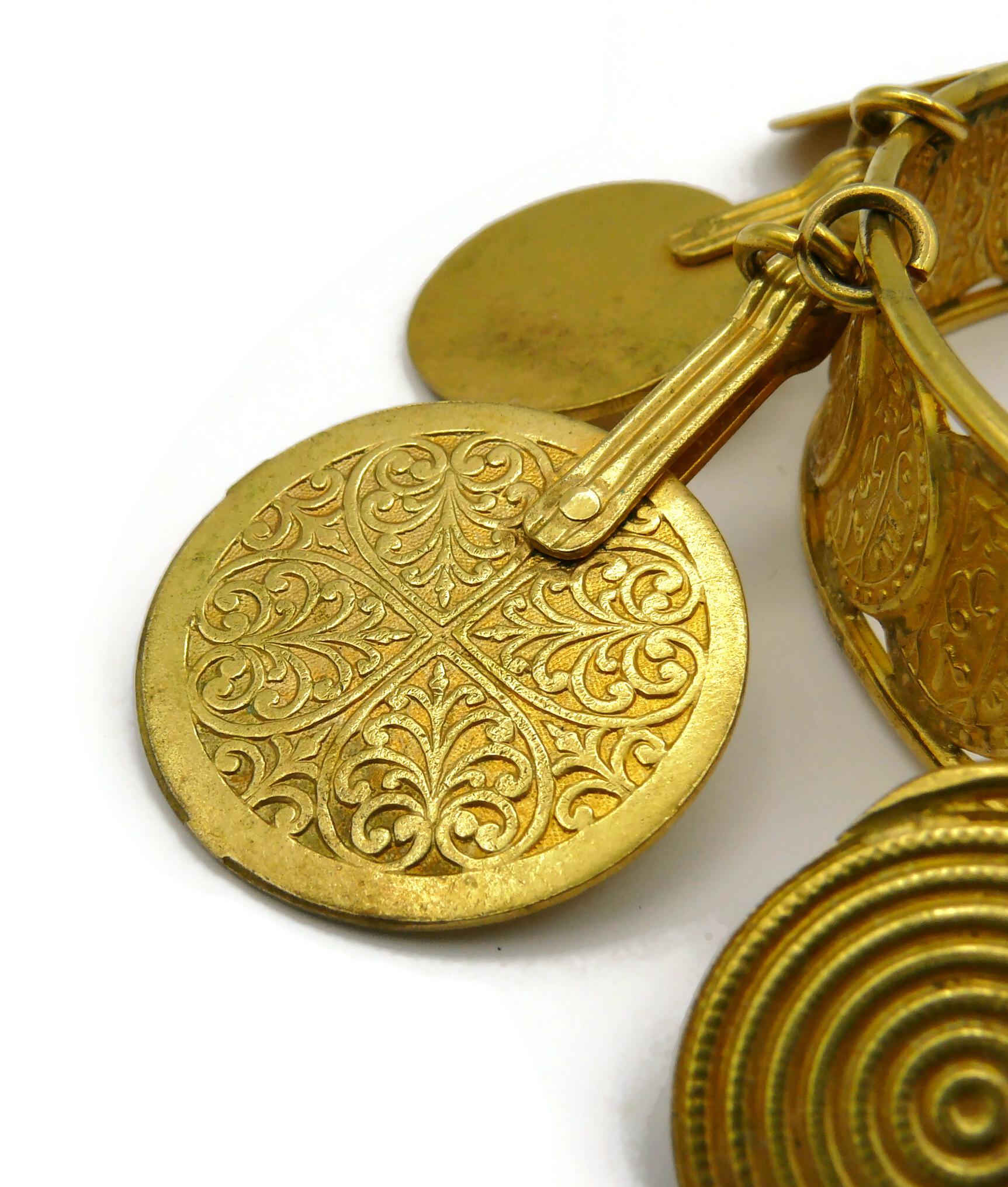 YVES SAINT LAURENT Bracelet jonc vintage à breloques médailles YSL en vente 16
