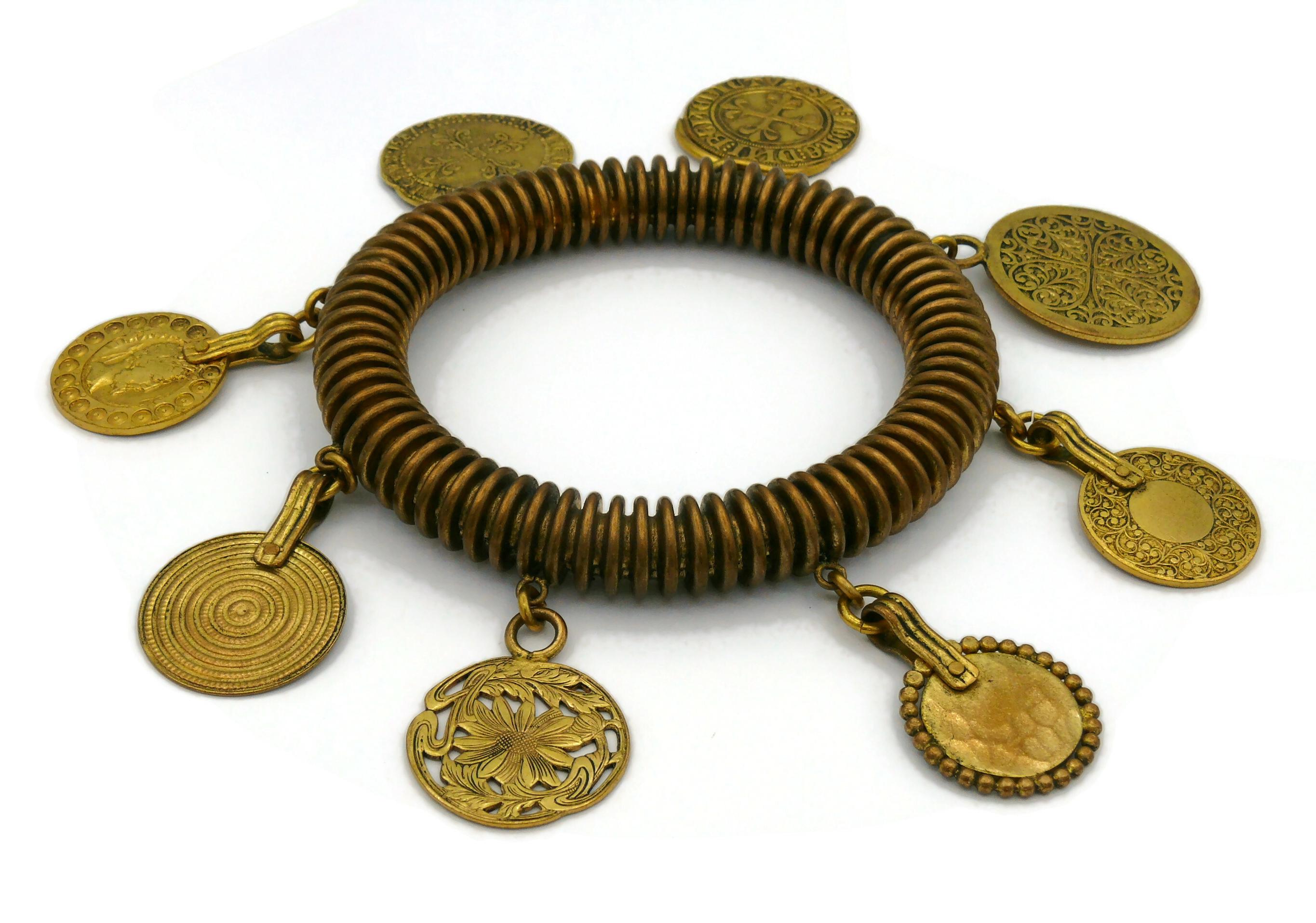 YVES SAINT LAURENT YSL Vintage Medal Charm Bangle Bracelet In Good Condition For Sale In Nice, FR
