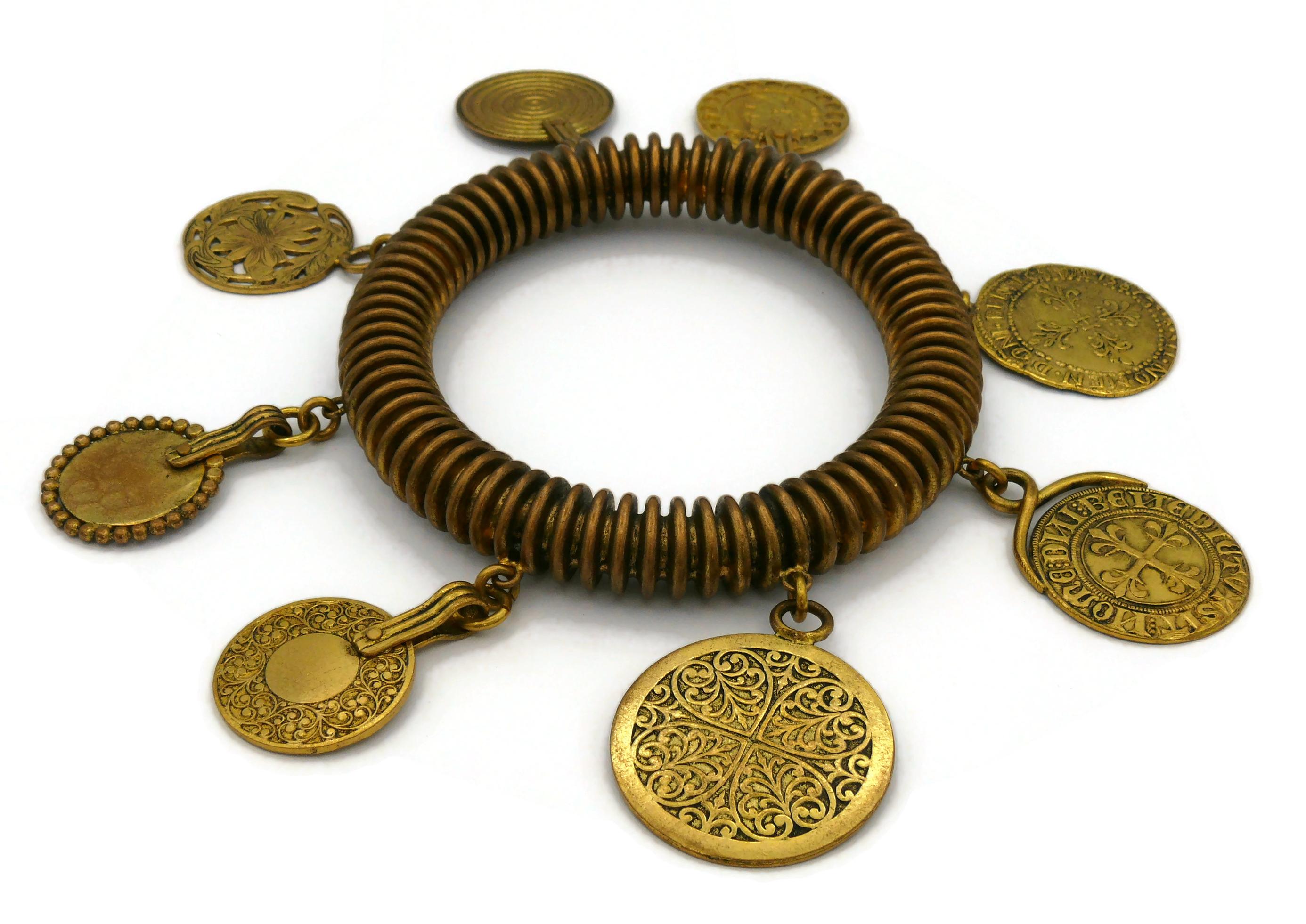 YVES SAINT LAURENT Bracelet jonc vintage à breloques médailles YSL en vente 4