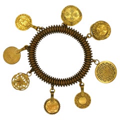 YVES SAINT LAURENT YSL Vintage Medal Charm Bangle Bracelet