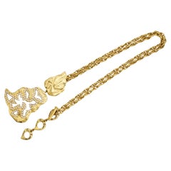 Collar largo llamativo de Yves Saint Laurent (YSL) vintage, con cristales y hojas de oro, muy exclusivo