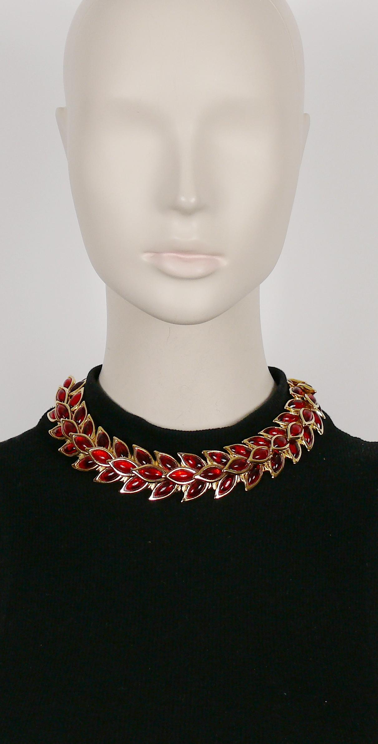 YVES SAINT LAURENT vintage gold toned choker necklace featuring ruby red poured resin in cascading wheat pattern.

Extension chain.
Hook closure.

Embossed YSL Made in France.

Indicative measurements : inner circumference from approx. 36.13 cm