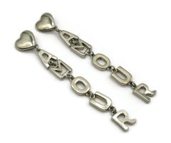YVES SAINT LAURENT YSL Pendants d'oreilles AMOUR couleur argent vintage
