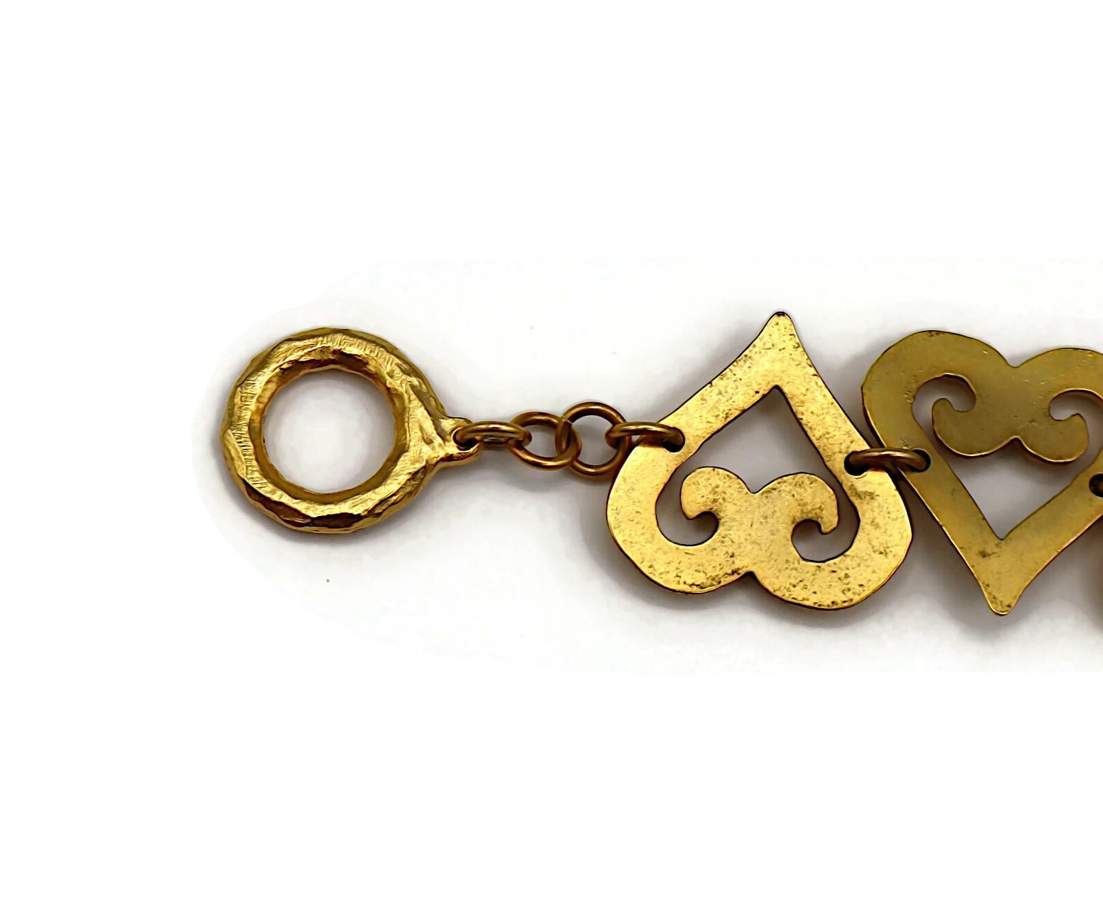 YVES SAINT LAURENT YSL Bracciale a cuore d'epoca con trama in tonalità oro in vendita 7