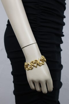 YVES SAINT LAURENT YSL Vintage Texturiertes goldfarbenes Herz-Gliederarmband