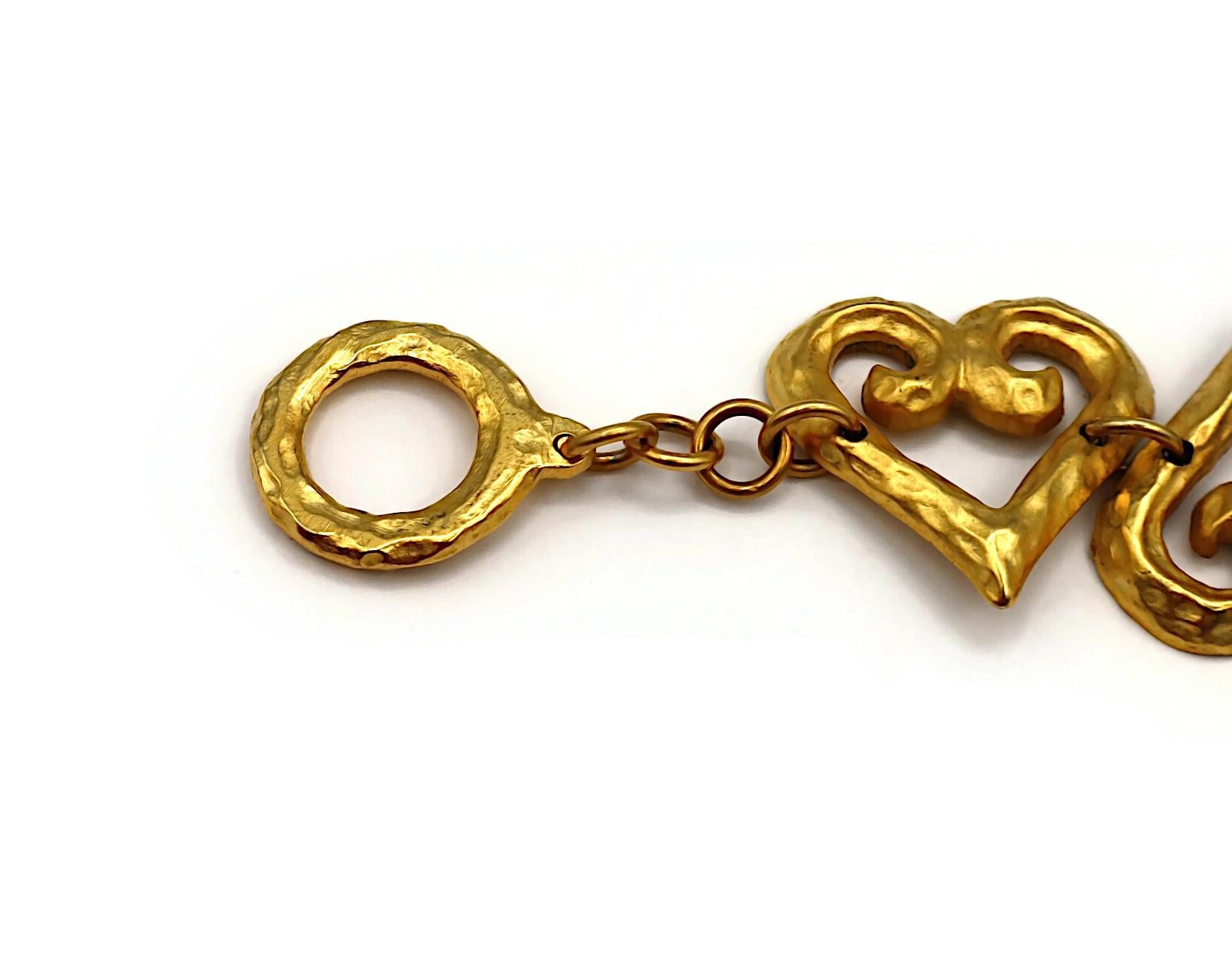 YVES SAINT LAURENT YSL Bracciale a cuore d'epoca con trama in tonalità oro in vendita 2