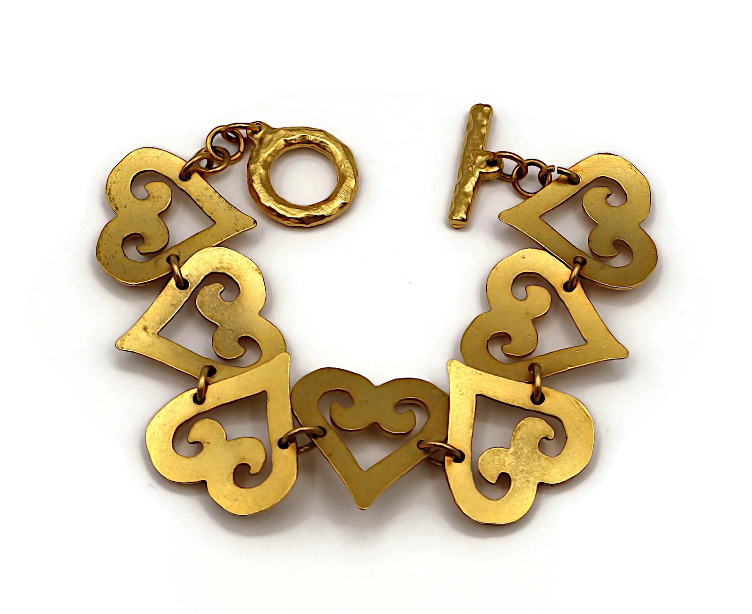 YVES SAINT LAURENT YSL Bracciale a cuore d'epoca con trama in tonalità oro in vendita 6