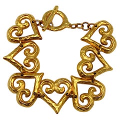 YVES SAINT LAURENT YSL Bracelet vintage à maillons en forme de cœur, doré texturé