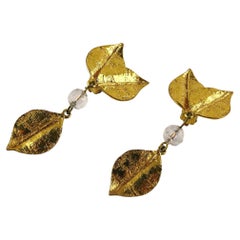 Boucles d'oreilles pendantes vintage Yves Saint Laurent YSL à feuilles texturées