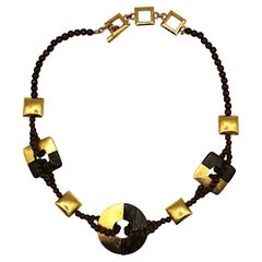 YVES SAINT LAURENT YSL Collier vintage en perles de bois et or