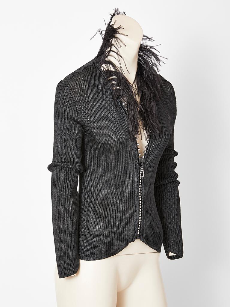 Alber Elbaz, for Yves Saint Laurent, Rive Gauche, black, ribbed, viscose knit, fitted, cardigan, having a center front zipper, embellished with rhinestones, and an ostrich feather collar. 