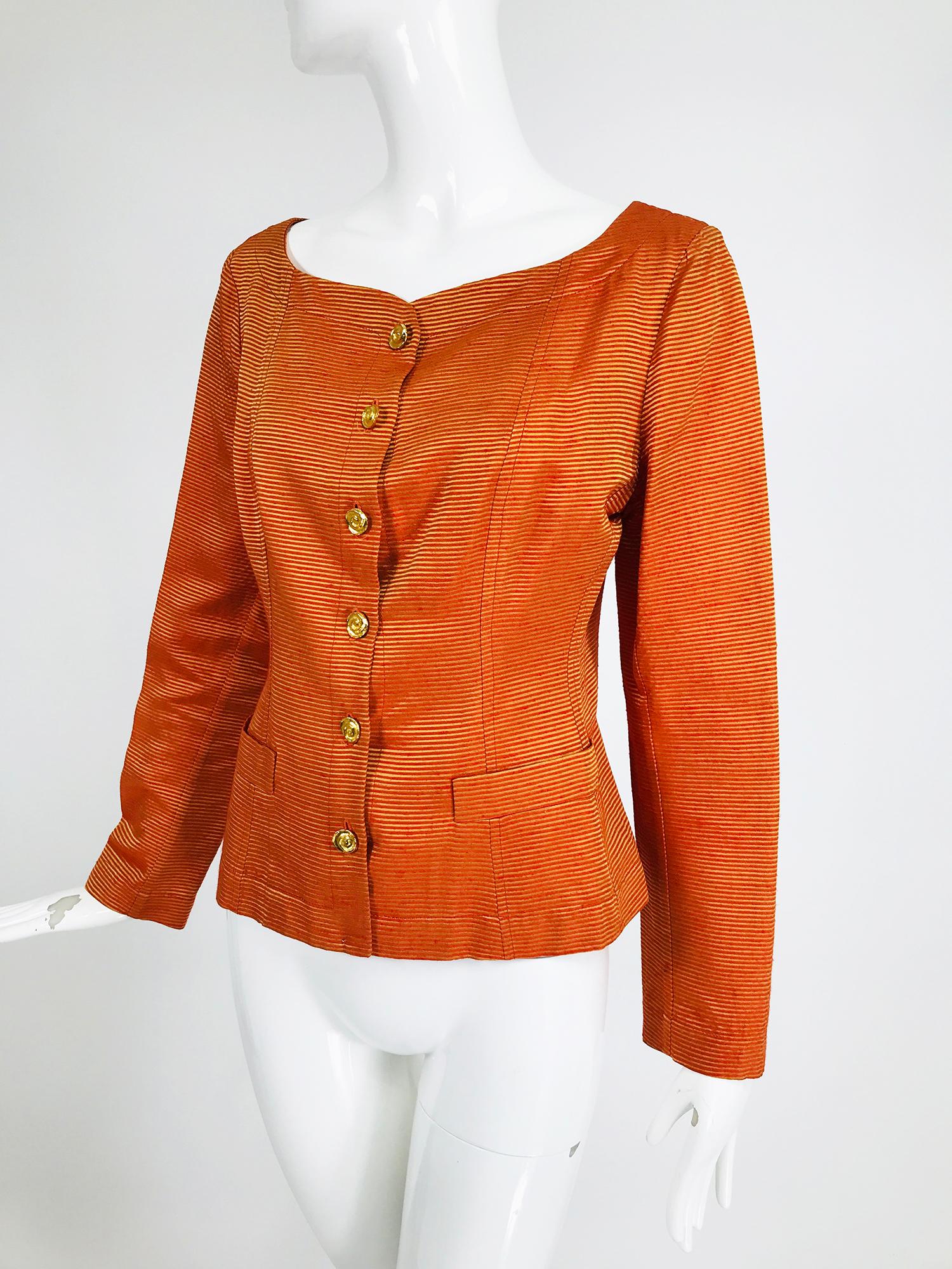 Yves Saint Laurent Rive Gauche vintage orange & gold stripe faille jacket with gold buttons. This jacket looks great with white jeans. Ribbed fabric with a small slub. 
Single breasted jacket with scoop neckline, long sleeves with single button