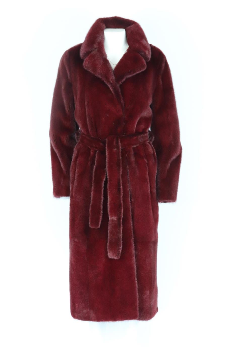 Yves Salomon belted mink fur coat. Burgundy. Long sleeve, v-neck. Hook, eye and belt fastening at front. 100% Mink; lining; 100% silk; fabric2; 100% polyester. Size: FR 40 (UK 12, US 8, IT 44) Shoulder to shoulder: 16 in. Bust: 42 in. Waist: 44 in.