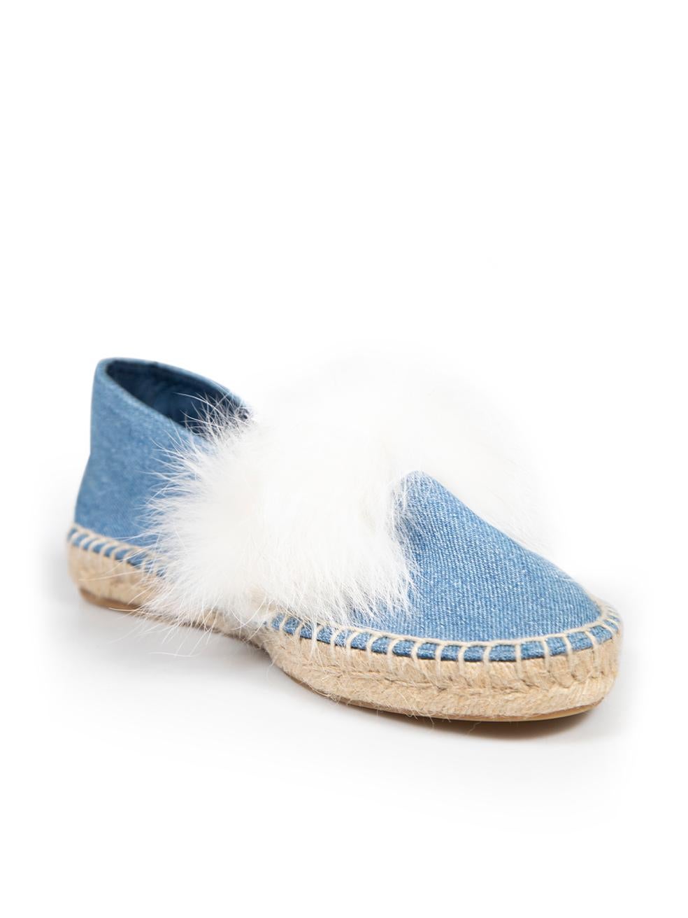 CONDITION is Very good. Minimal wear to espadrilles is evident. Minimal wear to back of right shoe with a small mark to the denim heel on this used Yves Salomon designer resale item.
 
 
 
 Details
 
 
 Blue
 
 Denim
 
 Espadrilles
 
 White fur