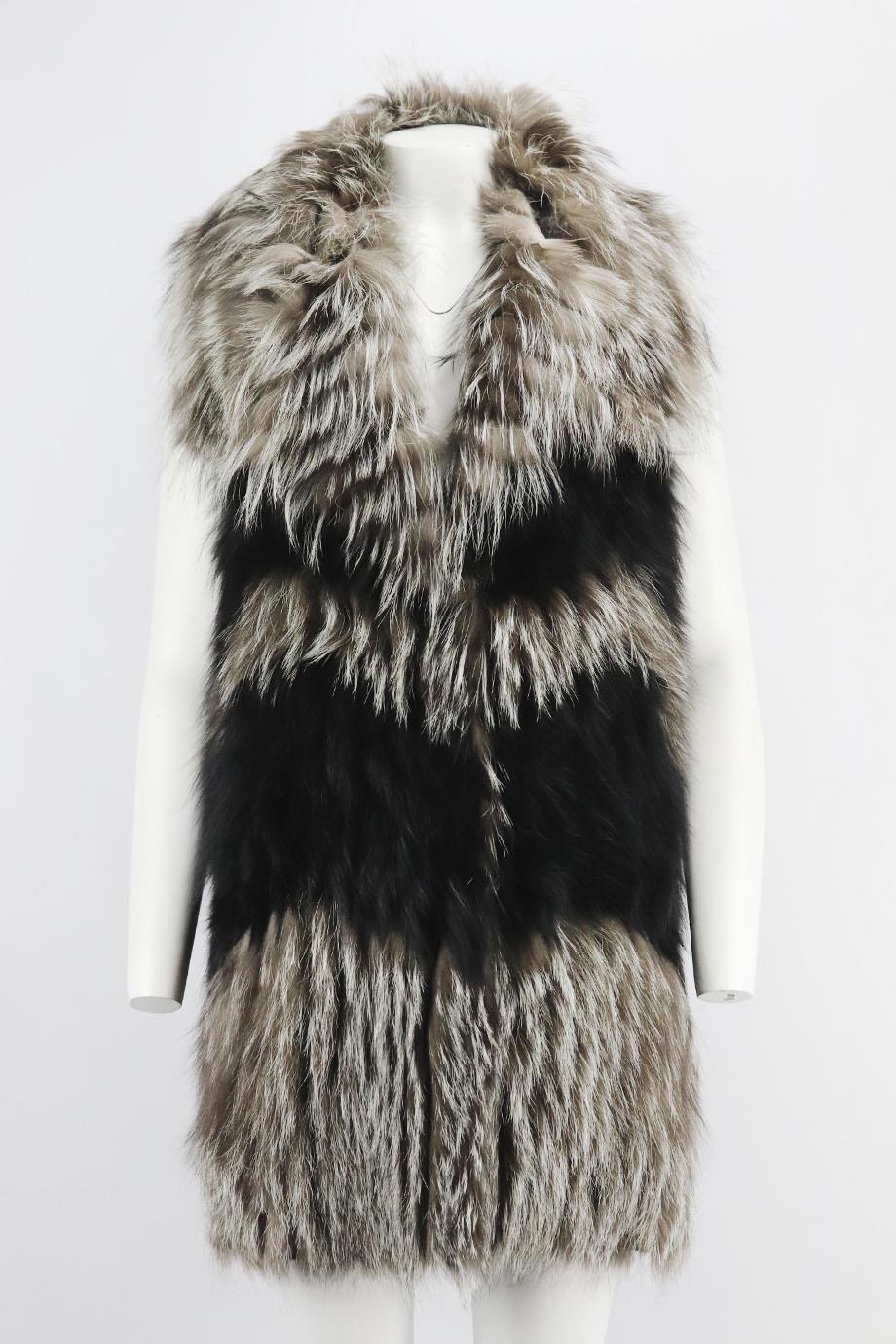 Yves Salomon fox fur gilet. Multicoloured. Sleeveless, v-neck. Snap button fastening at front. 100% Fox fur. Size: FR 36 (UK 8, US 4, IT 40). Bust: 36 in. Waist: 36 in. Hips: 36 in. Length: 29 in
