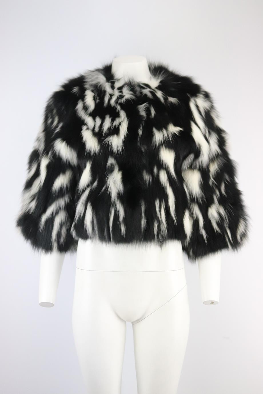 Yves Salomon fox fur jacket. Black and white. Short sleeve, crewneck. Snap button fastening at front. 100% Fox fur; lining: 100% silk. Size: Small (UK 8, US 4, FR 36, IT 40). Shoulder to shoulder: 16 in. Bust: 35 in. Waist: 36 in. Hips: 37 in.