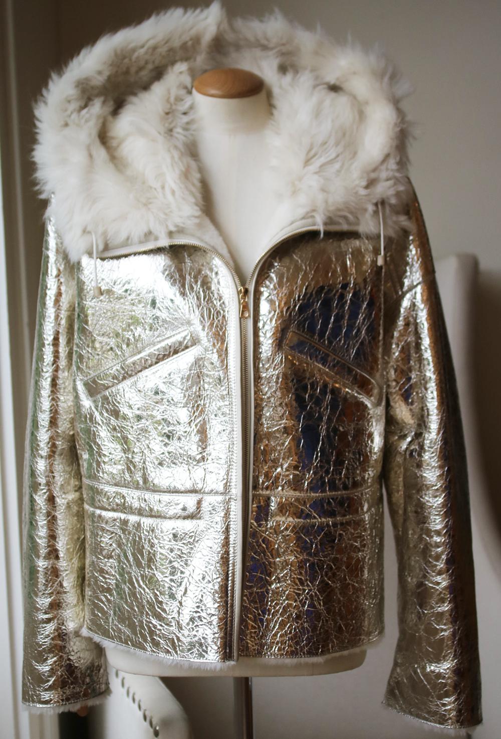 The craftsmanship at Yves Salomon may be traditional, but metallic styles like this jacket prove the collections are nothing short of modern. It's made from silver leather that's crinkled to enhance its shine and lined in plush shearling that bursts