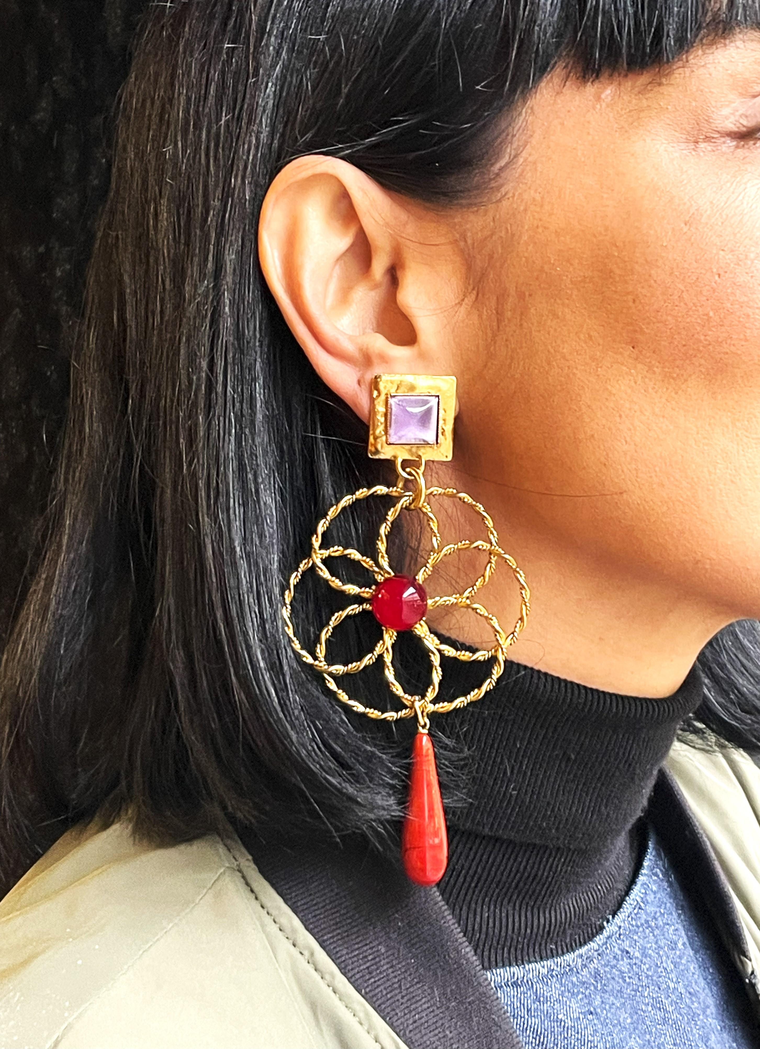 A unique ear clip from YSL Paris designed by Roger Scemama Pairs in the 1980s. 
Measurement: The full length of the ear clip 12 cm, 
The upper rectangular clip part  2 x 2 cm, the Scemama Flower 6 cm diameter, the attached drop 6 cm long. Excellent