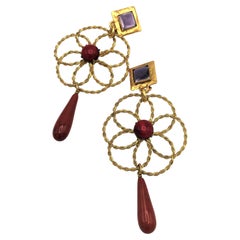 Pendientes de clip Yves Sant Laurent diseñados por Roger Scemama París para YSL 1980