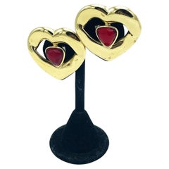 Vintage YVES SANT LAURENT larg openwork Heart Clip-on earring, with red heart inside