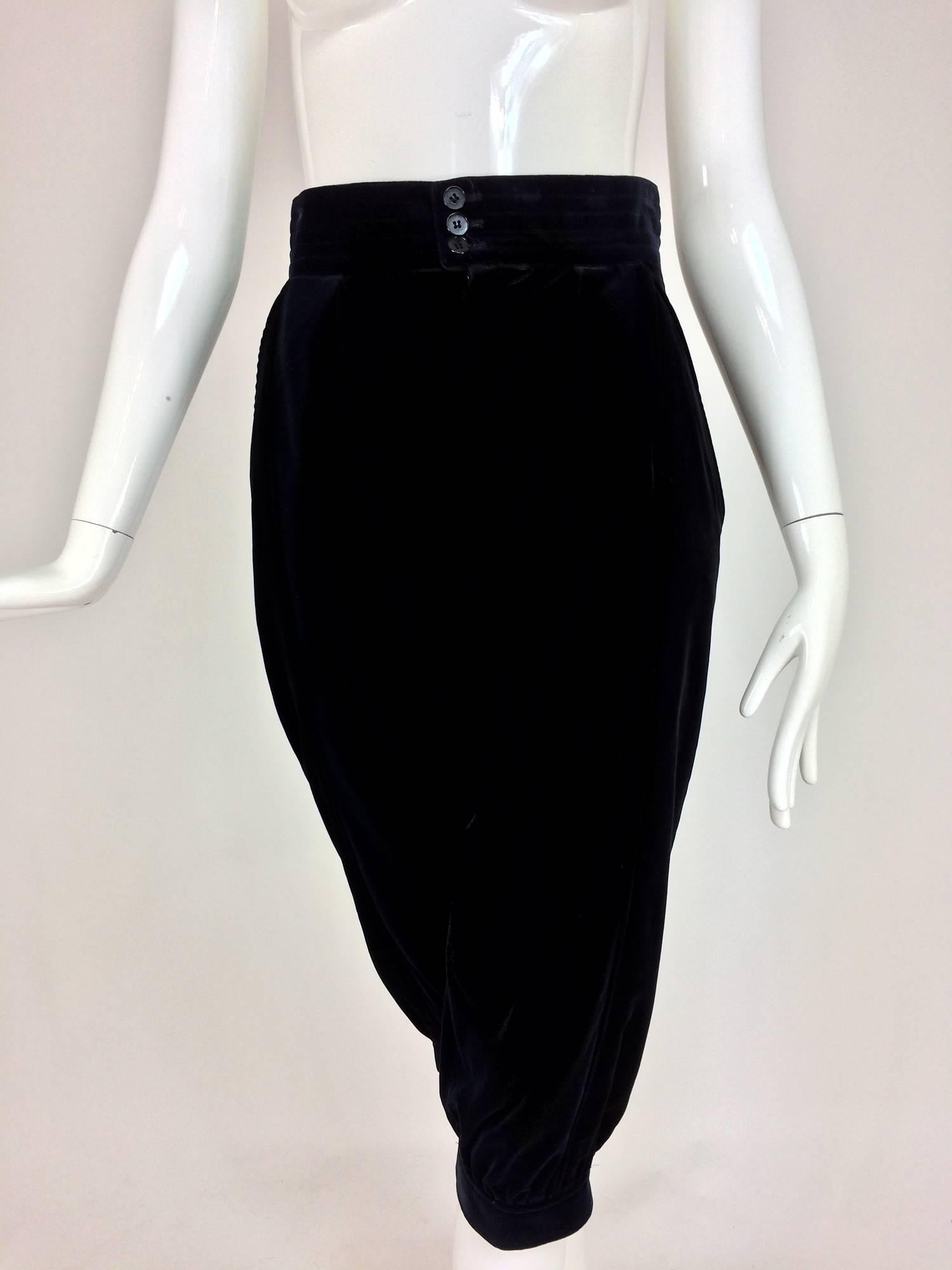 Yves St Laurent navy & black velvet knickers 1970s. Cotton velvet knee length trouser with a wide high waist band that closes with double buttons. The trousers are fitted at the back, the front has curved hip front pockets and a bit of gathering,