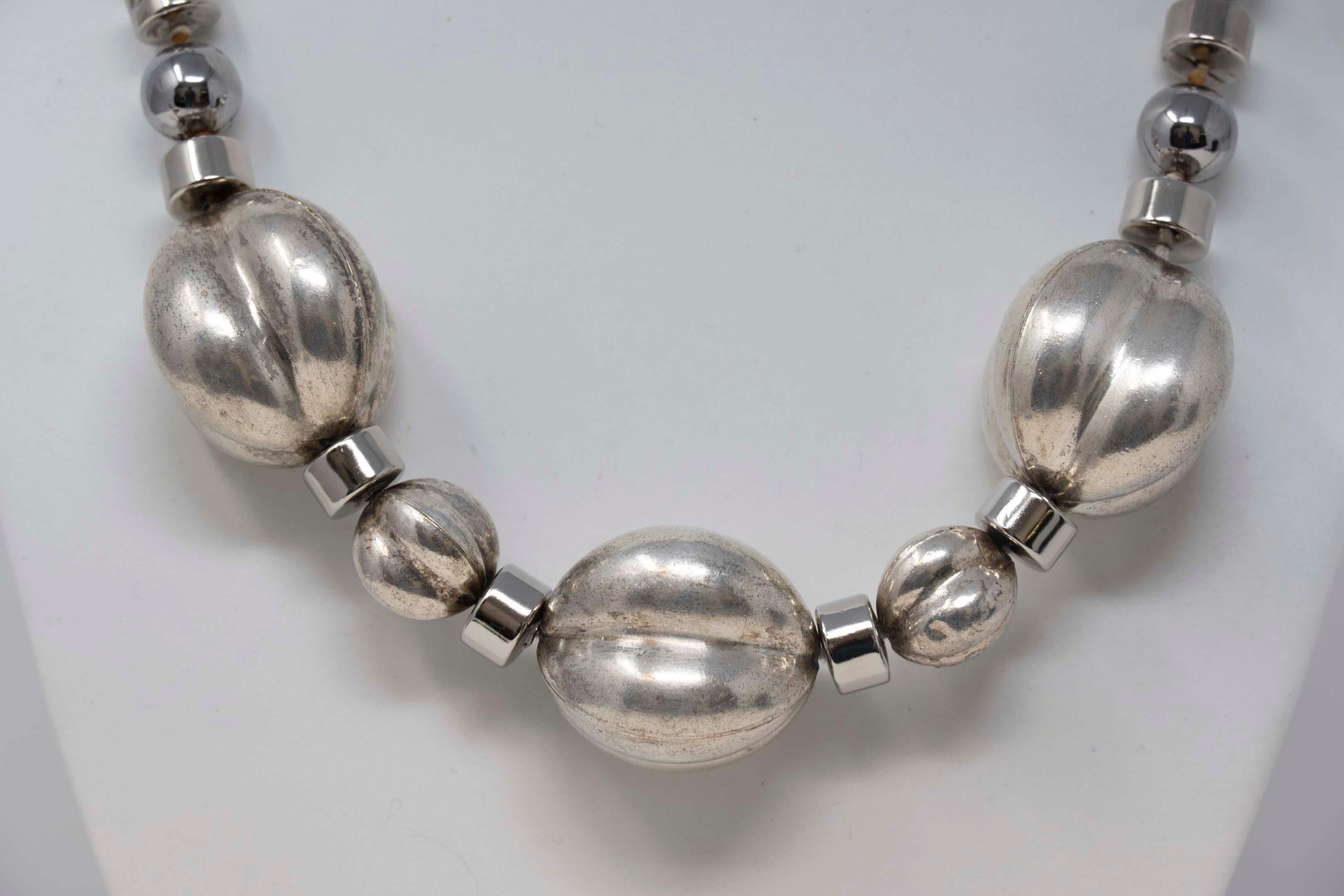Yves St Laurent silver tone chunky necklace. Measures 18 inches long, wear consistent with age, c.1990. Signed, metal silver tone.
