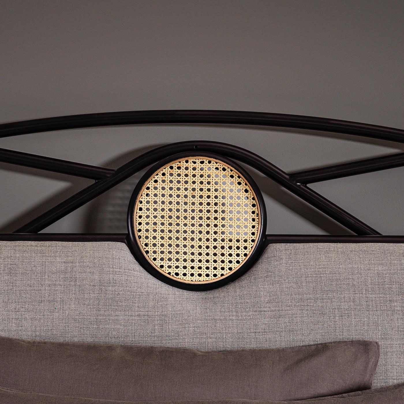 Inspired by the Belle Epoque, the Yvette Headboard, designed by Chiara Andreatti, complements subtle femininity with a bold creative spark. Characterized by its curving profile in black lacquered wood and metal tubing, the Yvette creates a delicate