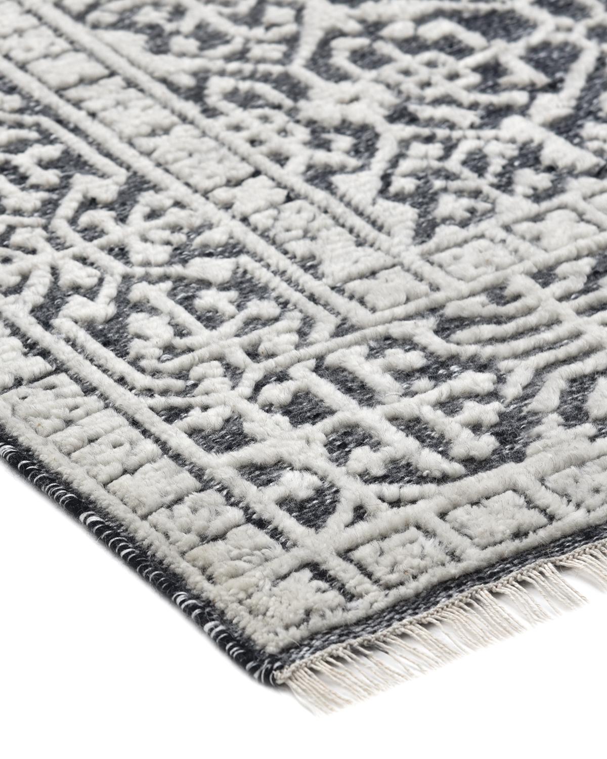 Bridging the gap between traditional and modern, the Transitional collection features rugs that exemplify versatility. Hand-knotted in India, using methods passed down for generations, these rugs will maintain beauty for years.