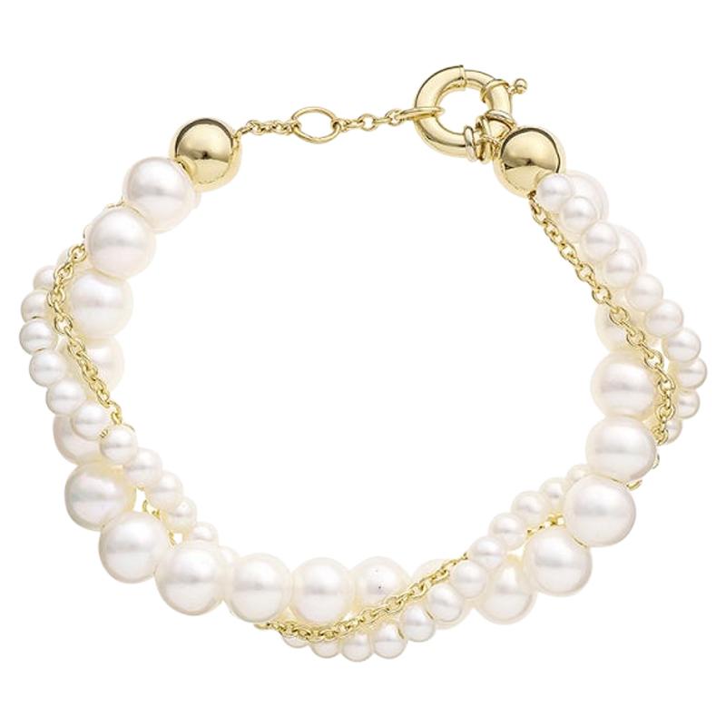 Yvonne Leon' Lady Bracelet with Twisted Pearls and Chain in 18 Karat Yellow Gold For Sale