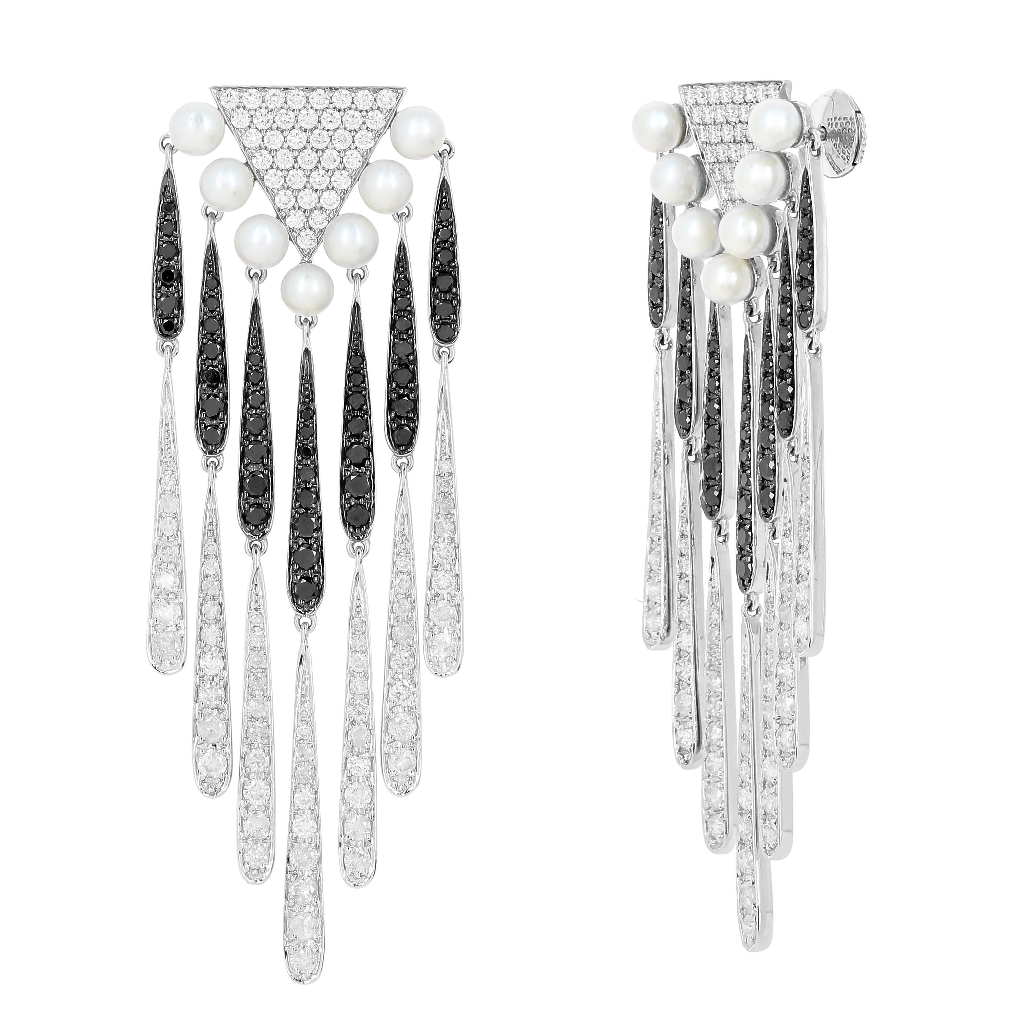 Yvonne Leon's Pair of Earrings in 18K Gold with Diamonds and Black Diamonds  For Sale