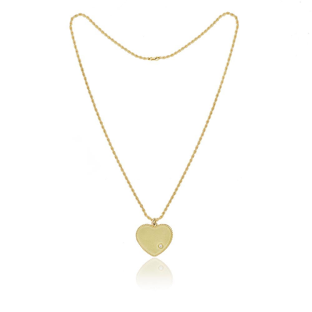 Heart Necklace in 18K Yellow gold 4,7gr approx.
Diamonds 0,02ct approx.
Cord Chain 42cm
