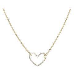 Yvonne Leon
s Small Heart Necklace in 18 Carat Yellow Gold and Diamonds