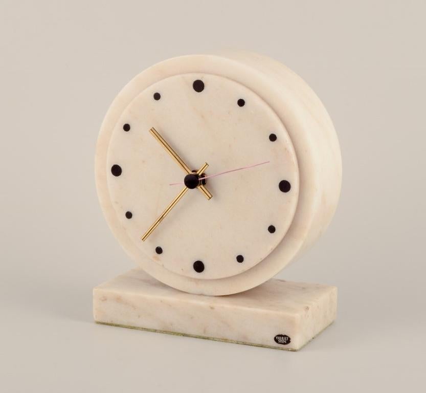 Art Deco Yxhult Sten, Sweden. Tabletop clock in white marble with brass hands