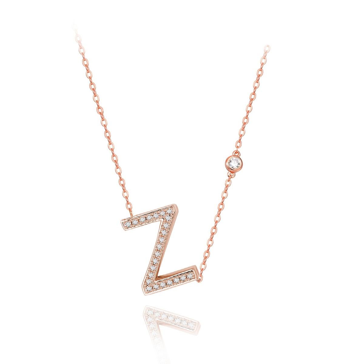 Nothing says YOU more than YOU. You are unique. You are bold. You're not afraid to share who you are. This initial bezel chain necklace is elegantly slimline while sharing a little bit about yourself with others. .925 sterling silver base also