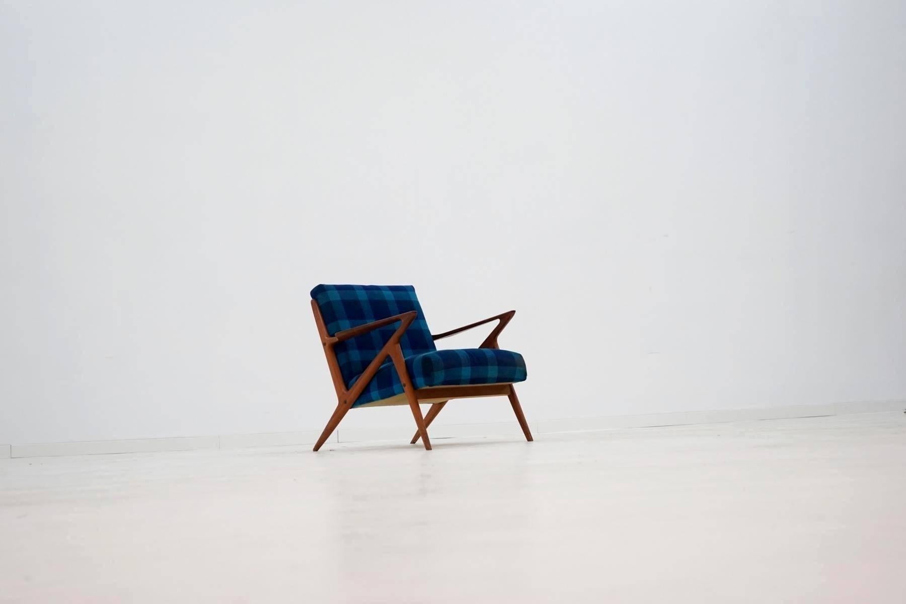 Fauteuil lounge Z de Poul Jensen & Selig midcentury Danish modern, 1950s.
Très rare et ancienne version de la chaise Z ! Avec de vieilles applications en laiton.
 