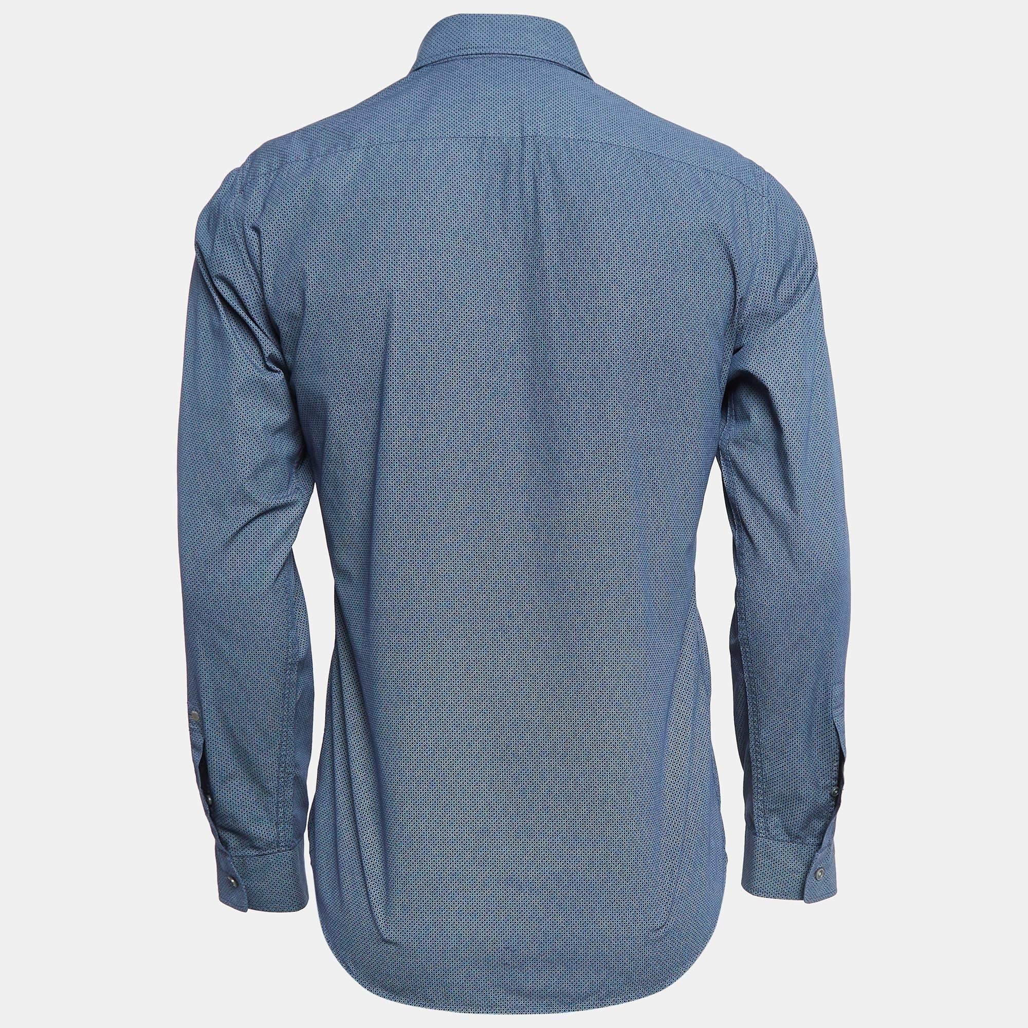 Shirts are an indispensable part of a wardrobe so this brand brings you a creation that is both versatile and stylish. It has been tailored from quality material in a versatile shade. The shirt is detailed with signature elements and a comfortable