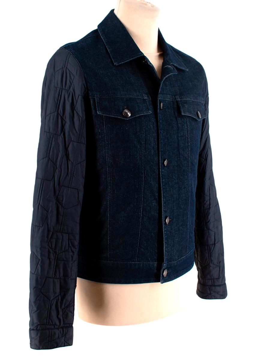  Z Zegna Hybrid Denim Jacket with Quilted Sleeves
 

 - Dark denim jacket with contrasting sleeves
 - Quilted puffer sleeves with a button fastening 
 - Dark silver tone hardware 
 - Button up front fastening
 - Two chest flap pockets and two slit