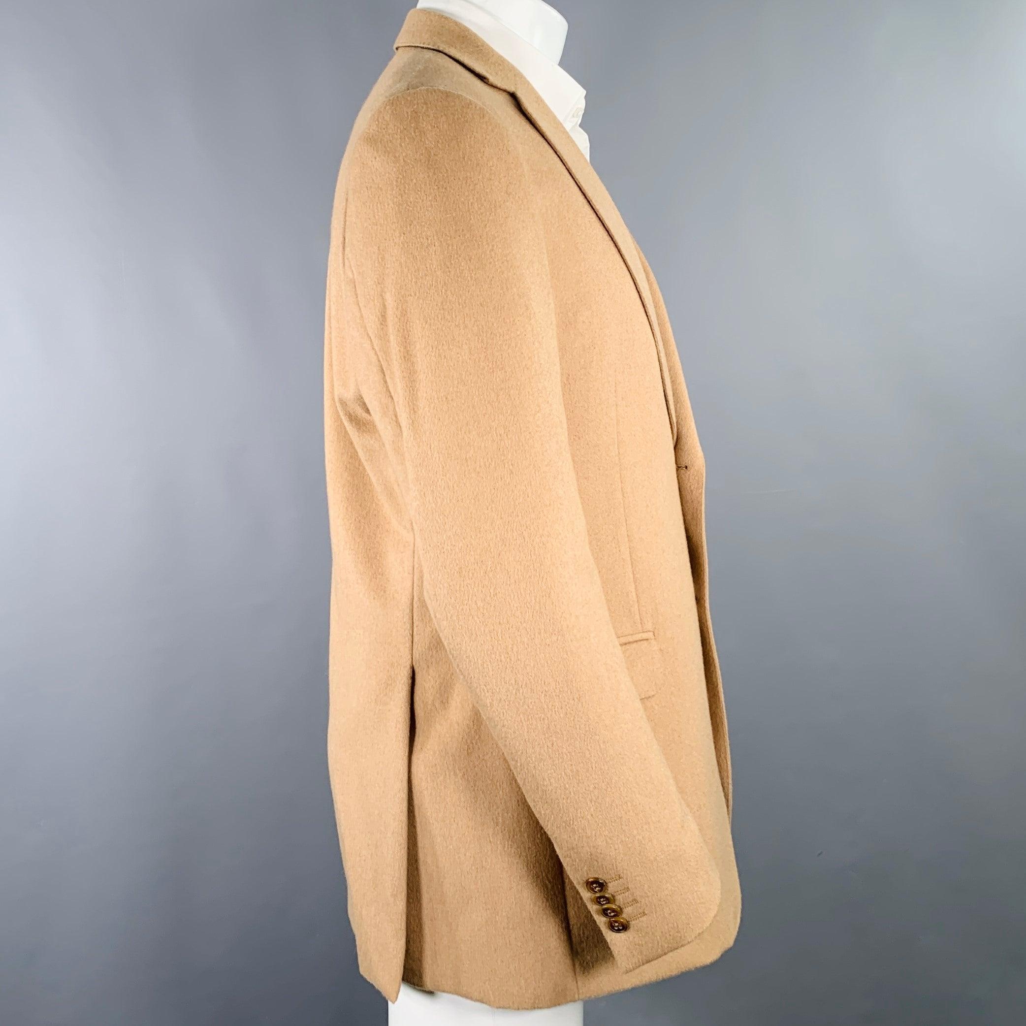Z ZEGNA sport coat
in a
beige camel hair featuring a single breasted style, notch lapel, double vented back, and double button closure. Excellent Pre-Owned Condition. 

Marked:   IT 50L  

Measurements: 
 
Shoulder: 17.5 inches Chest: 43 inches