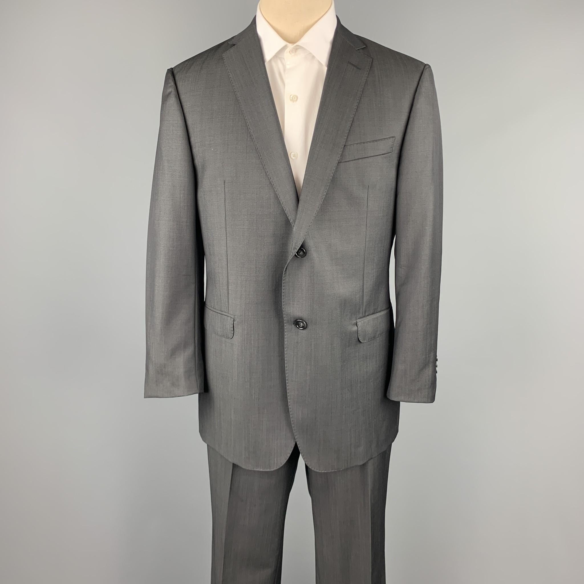 Z ZEGNA suit comes in a charcoal wool / mohair and includes a single breasted, two button sport coat with a notch lapel and matching flat front trousers. 

Excellent Pre-Owned Condition.
Marked: 54 R

Measurements:

-Jacket
Shoulder: 18 in. 
Chest: