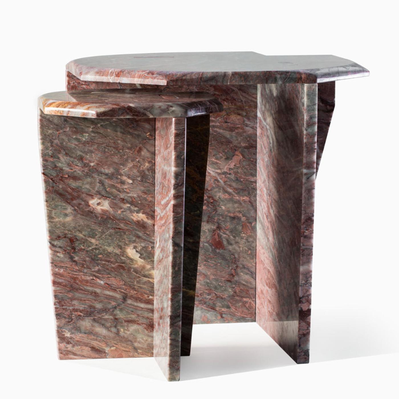 This elegant Salomé marble coffee table features one central support. The Z series uses joints and no glue or screws. The combinations can be customized with two different kinds of marble for top and bottom among the following: green Guatemala,