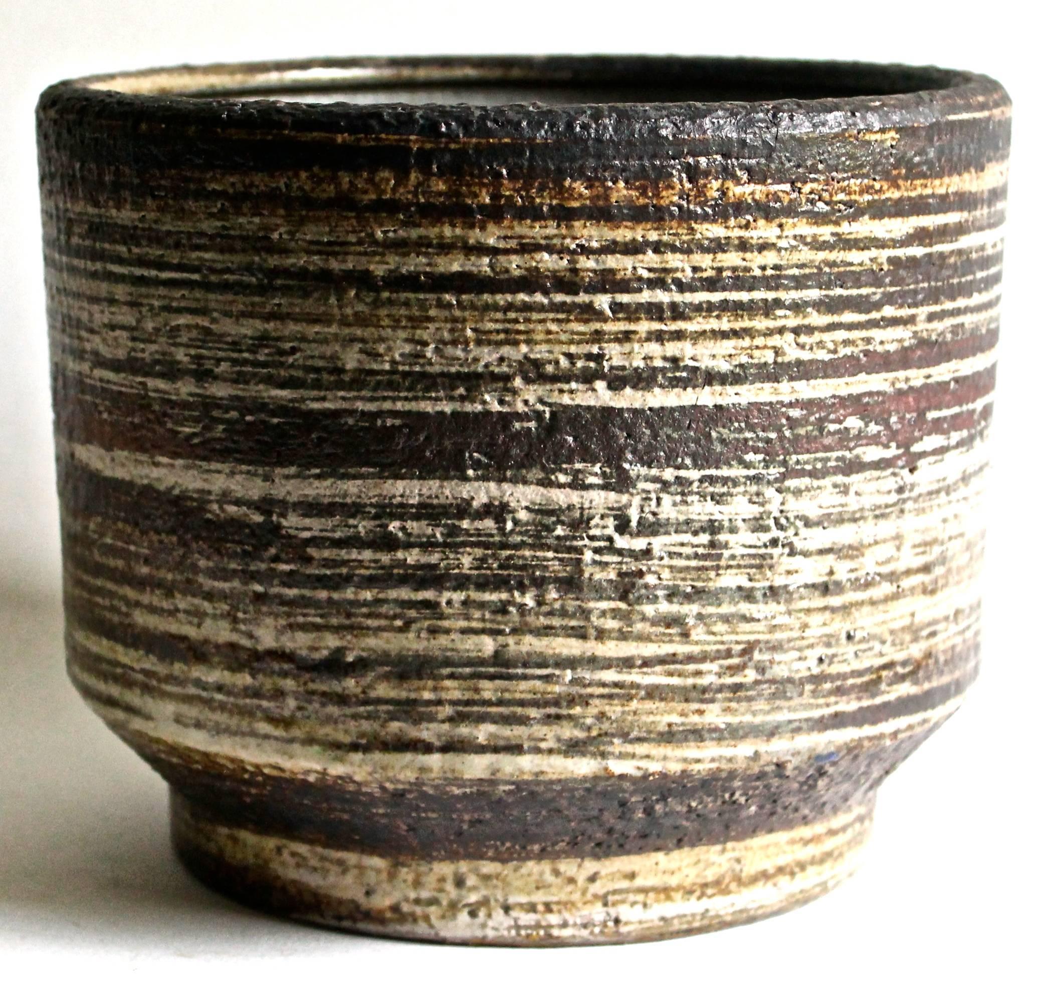 A strong and large vase, with brown and tan Brutalist glaze.