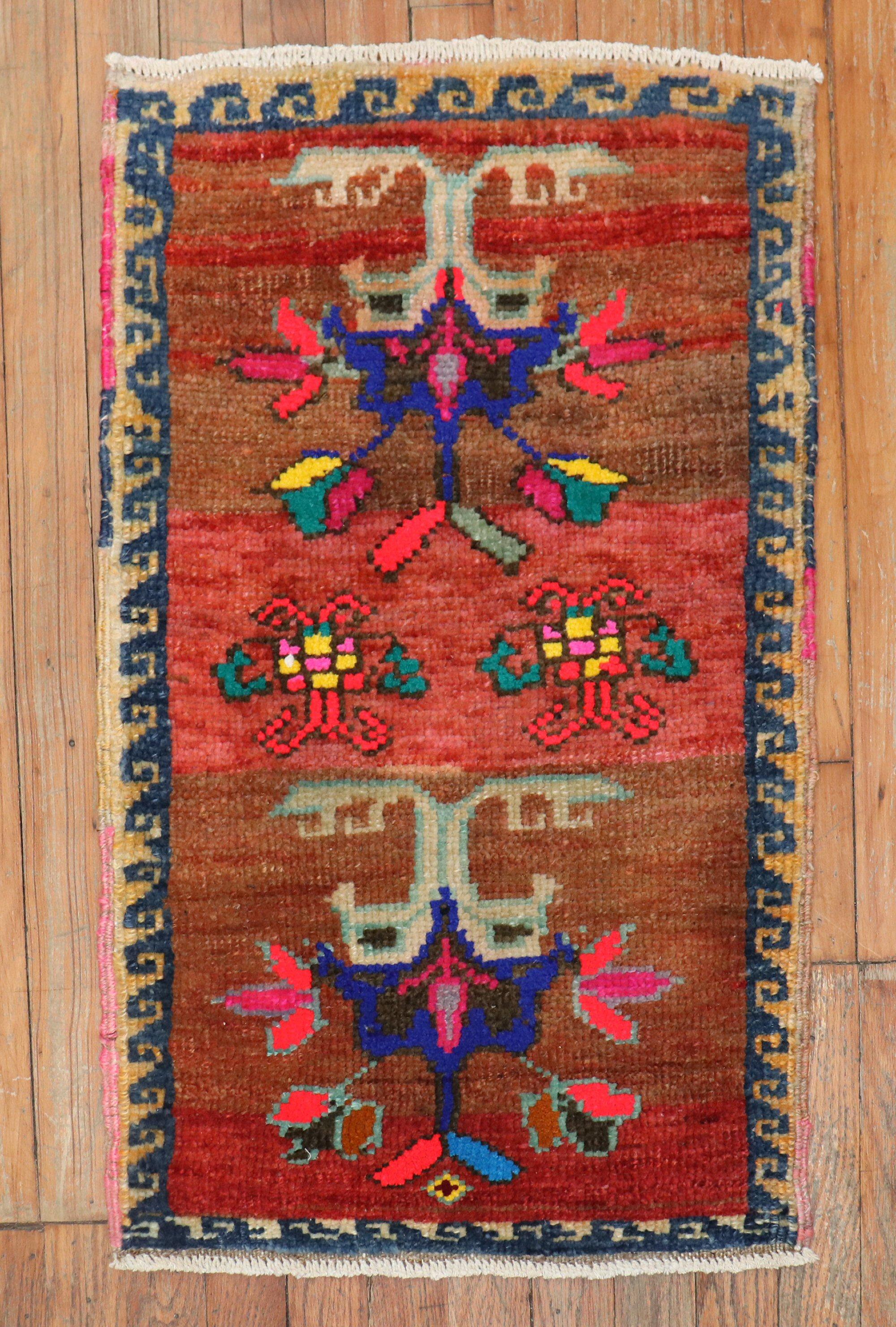 Mini size mid 20th century turkish anatolian rug

Measures: 1'8'' x 2'7''.