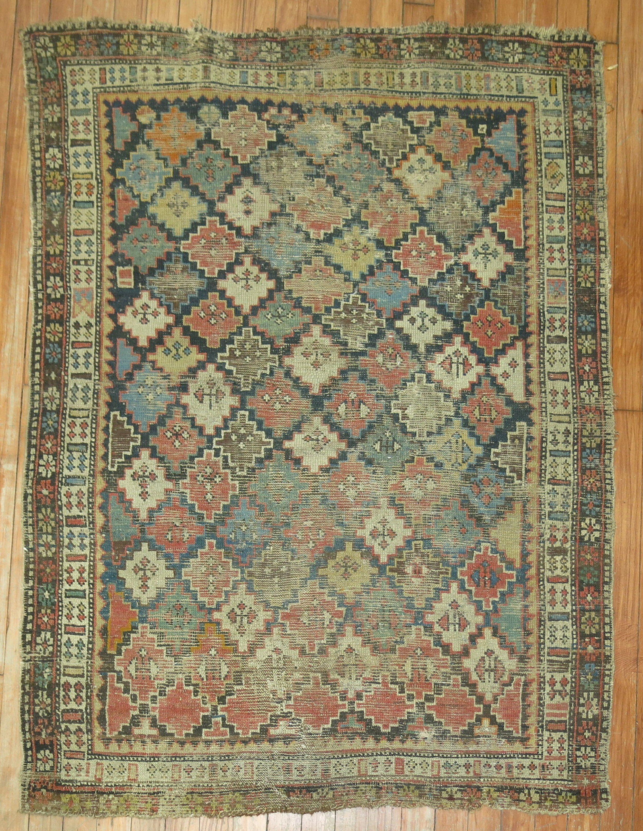 Tribal Zabihi Collection 19th century Distressed Antique Caucasian Rug For Sale