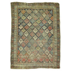 Zabihi Collection 19th century Distressed Antique Caucasian Rug