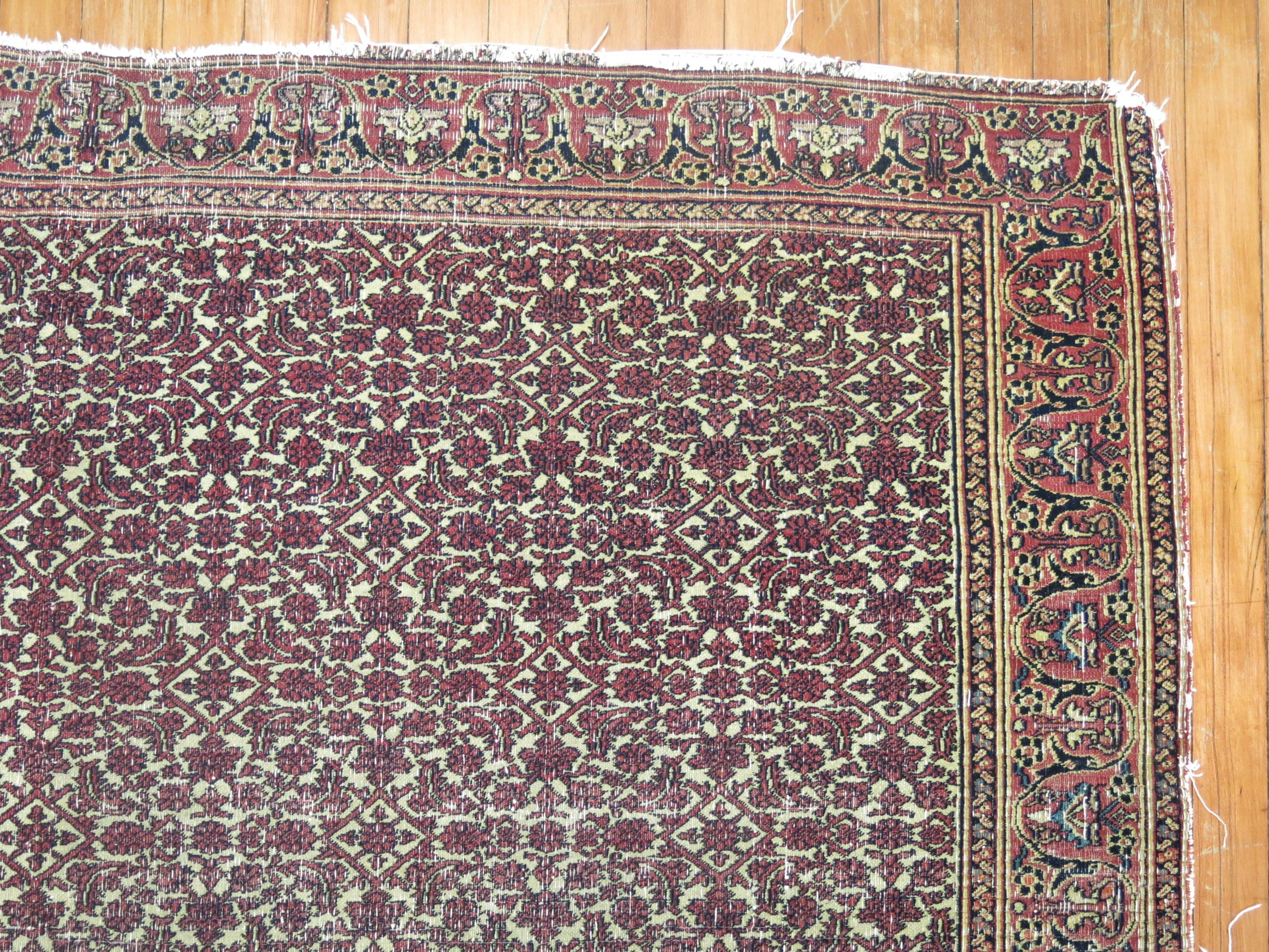 Hand-Knotted Zabihi Collection 19th Century Distressed Persian Rug For Sale