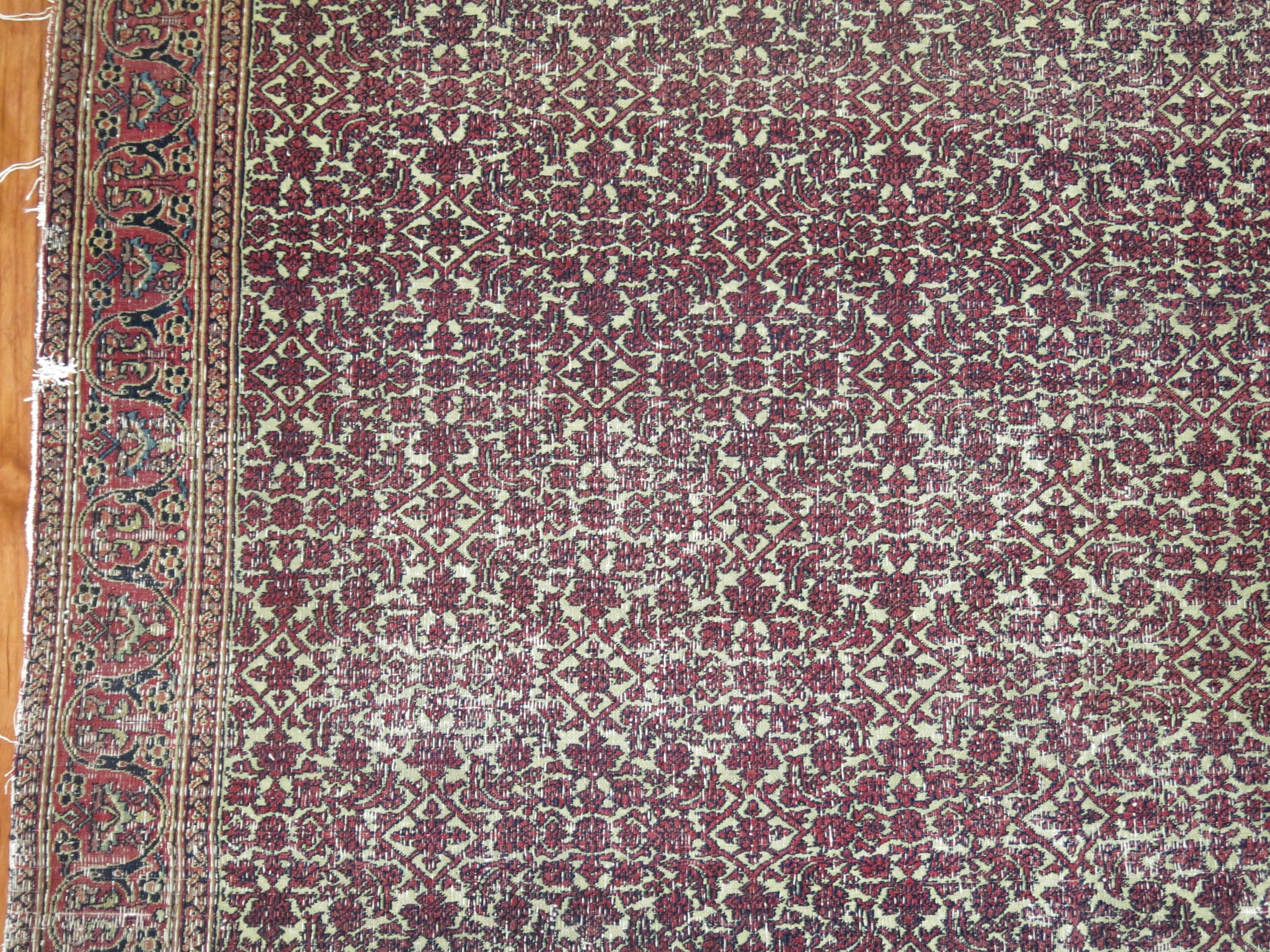 Noué à la main The Collective 19th Century Distressed Persian Rug (tapis persan vieilli du 19e siècle) en vente