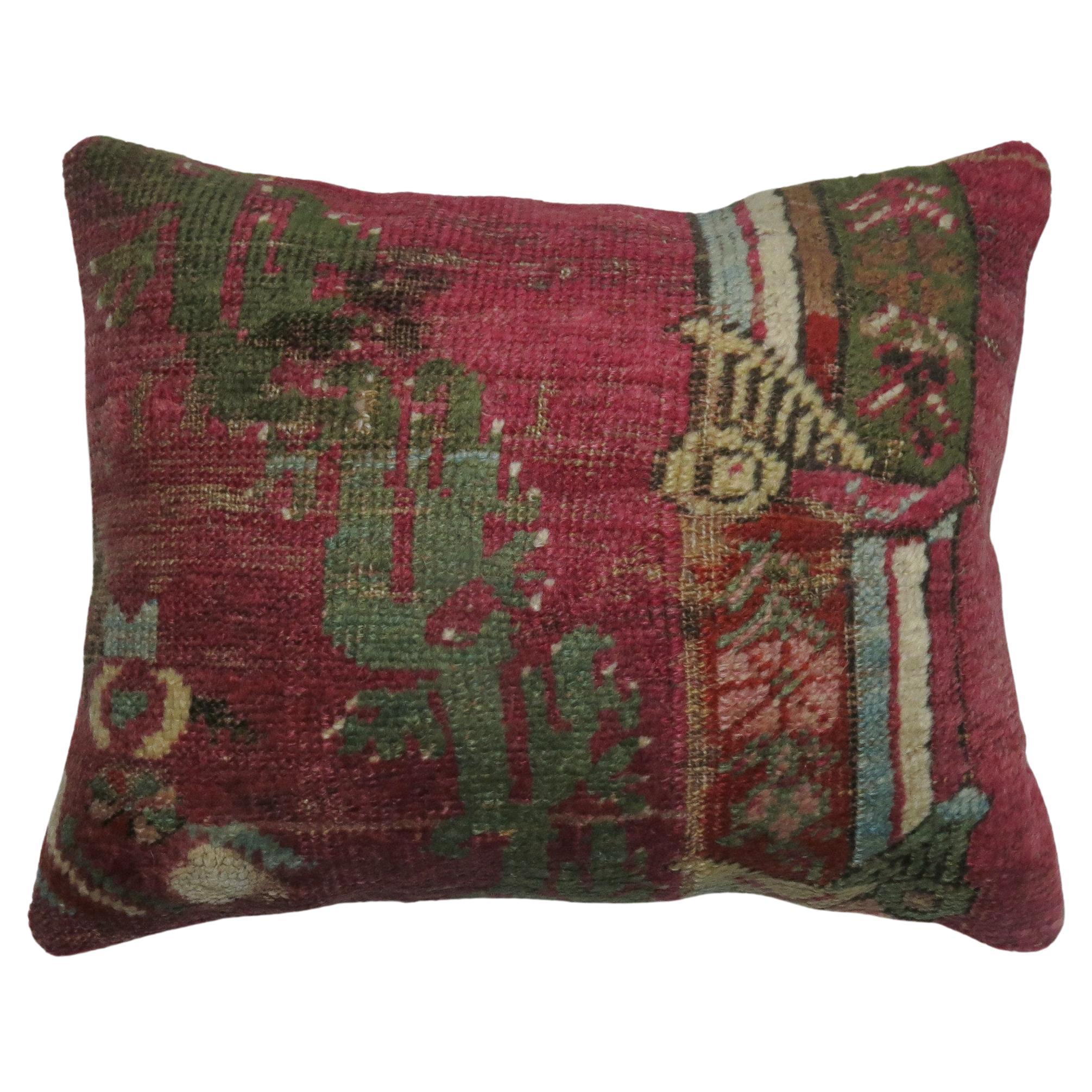 One of a kind rug pillow made from a  19th century turkish rug with cotton back and zipper closure.
14'' x 17''
    