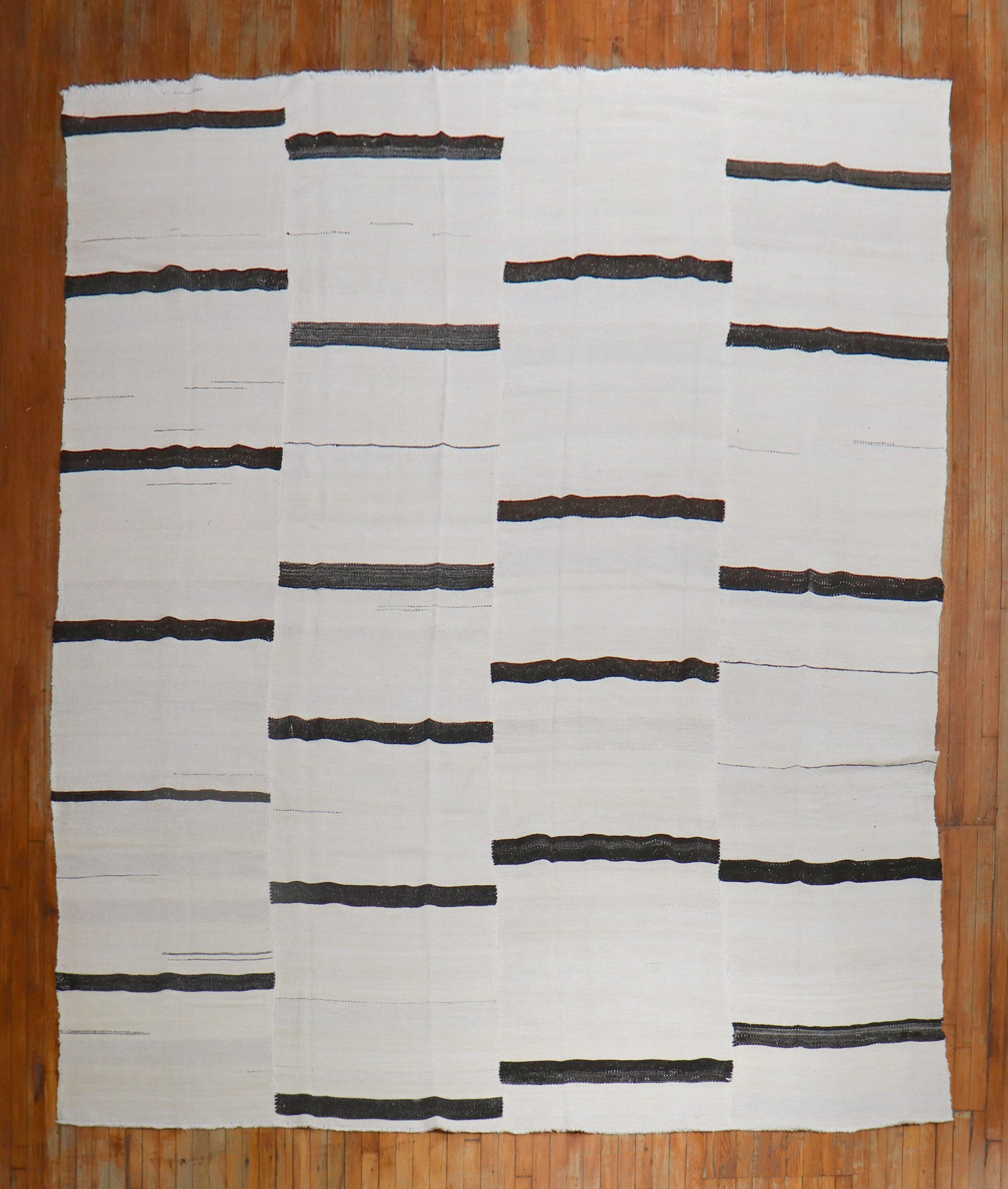 a 3rd quarter of the 20th Century Vintage Turkish Wool Kilim in white and dark brown

Details
rug no.	j2434
size	10' x 12' 9